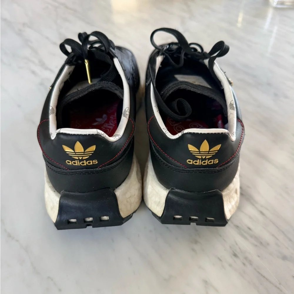 adidas Black and White Retro Runner Sneakers with Gold Accents - Picture 3 of 5